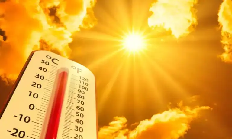 Imagem de um termômetro sob o calor do sol
